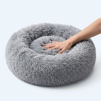 Hand pressing into the deep fill of the bed